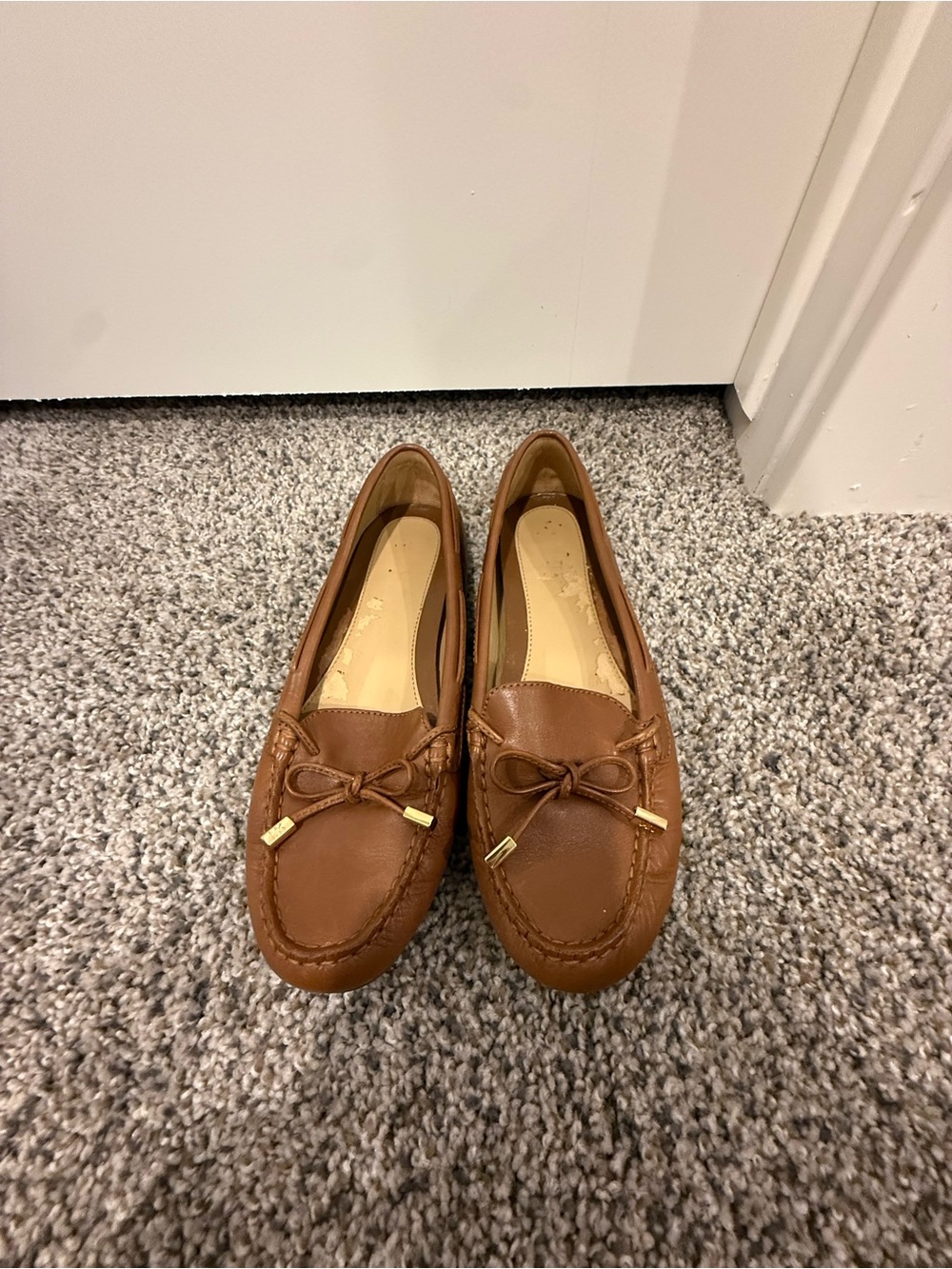 Women’s Michael Kor’s brown leather loafers size 7.5.